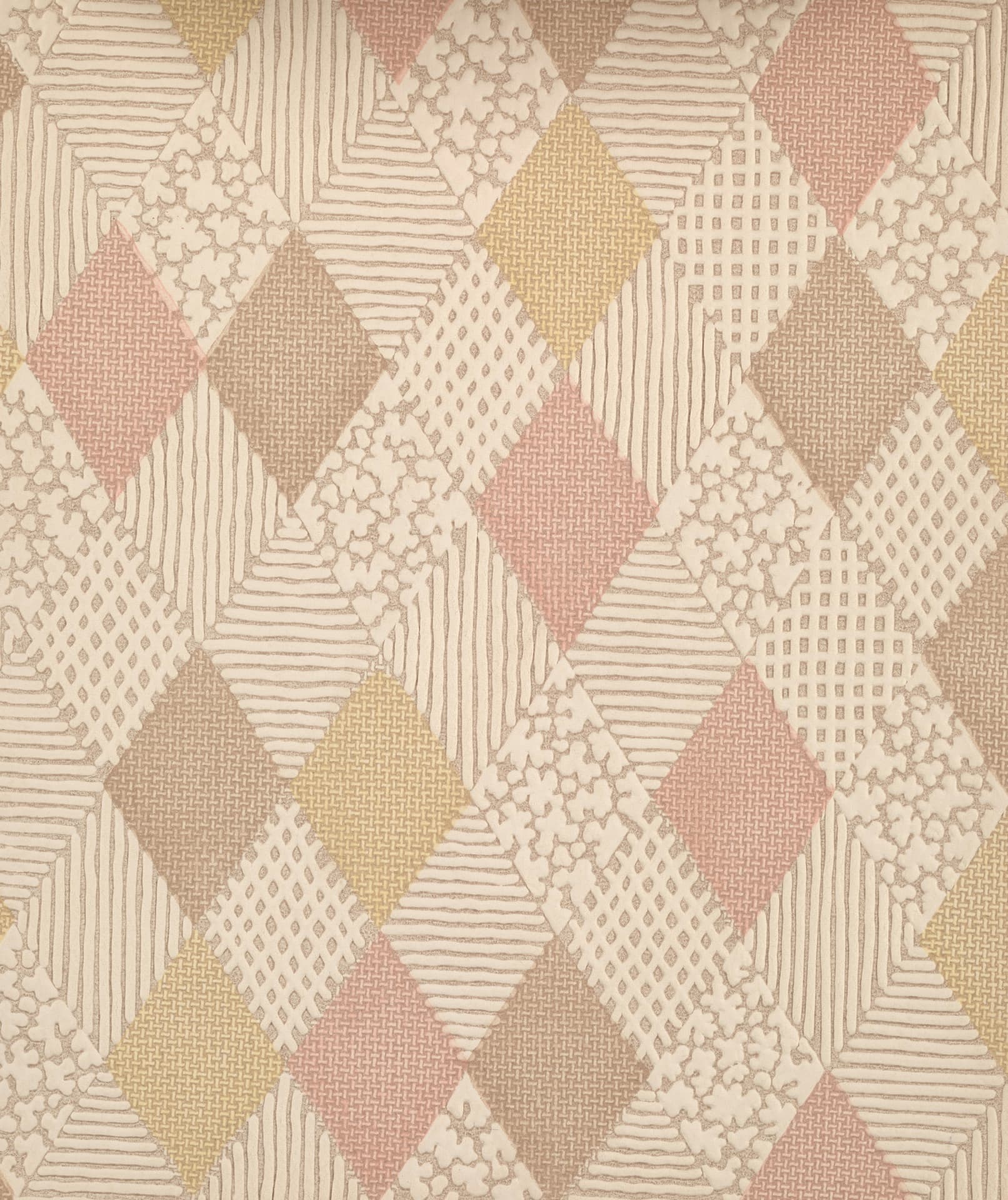 Soft pastel patchwork quilt pattern in cream, blush, and gold